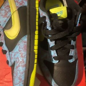 Nike Black and Blue Sneakers with Classic Silhouette